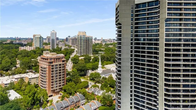 a view of a city with tall buildings