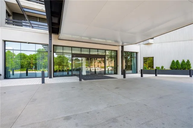 a view of an empty room with a balcony