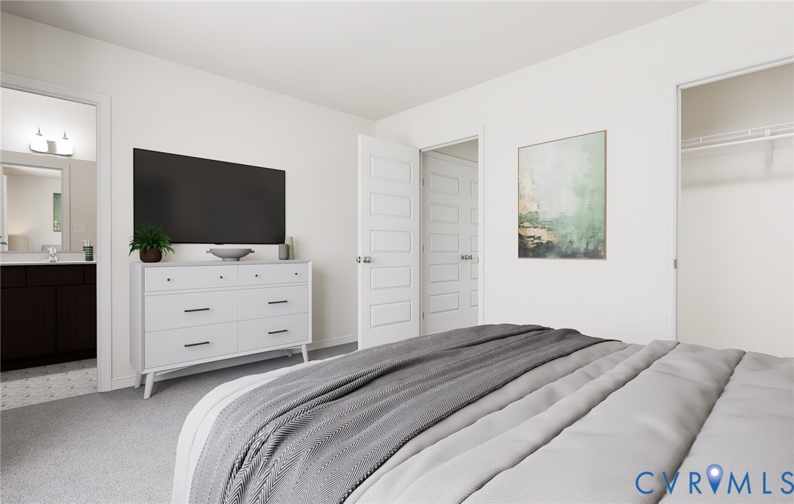 282 Greenpark Road Sandston, VA 23150 - Photo 14 of 29 a bedroom with a bed and flat screen tv