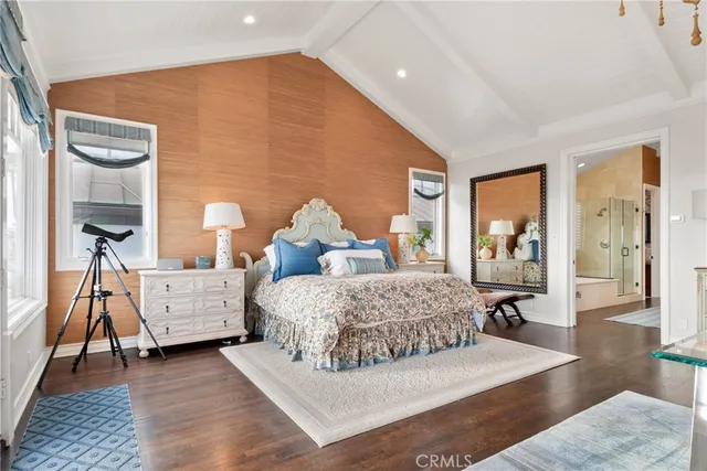 a spacious bathroom with a granite countertop tub shower and a sink