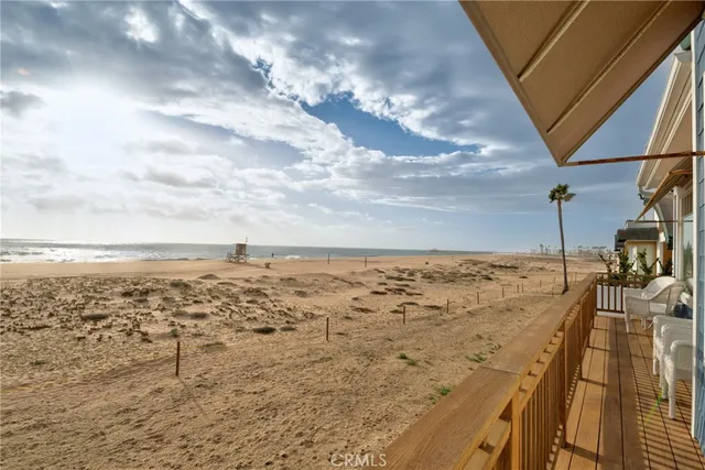 a bedroom with a bunk bed and a window