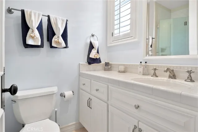 a bathroom with a tub and sink