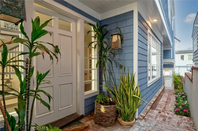 a view of a potted plants with sky from a balcony