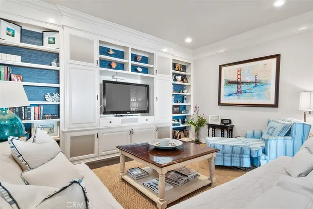 a kitchen with stainless steel appliances granite countertop a stove and white cabinets