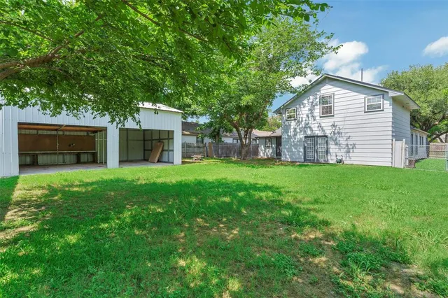 a house view with a garden space