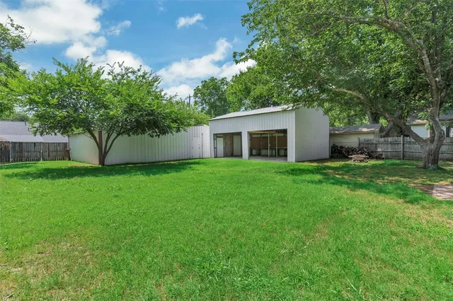 a house view with a garden space