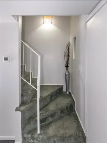a en suite bathroom with a sink and a mirror