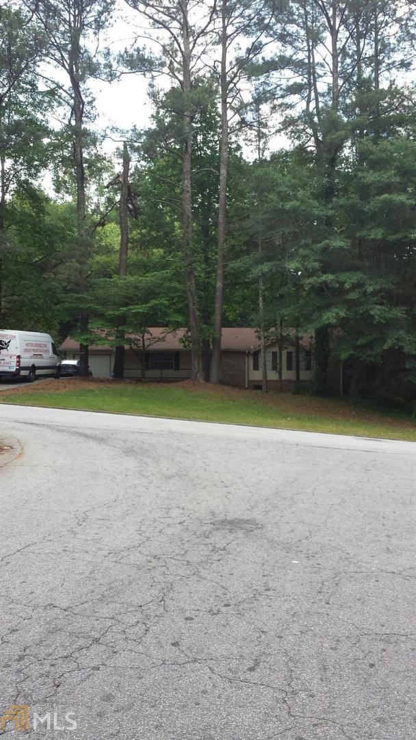 4563 Mercer Road Stone Mountain, GA 30083 - Photo 1 of 1 a view of a park with large trees