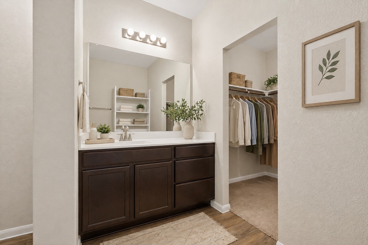 5905 Diamondleaf Bend Austin, TX 78724 - Photo 17 of 38 Bathroom vanity with dark wood-finish cabinetry, a white countertop, and an integrated sink
