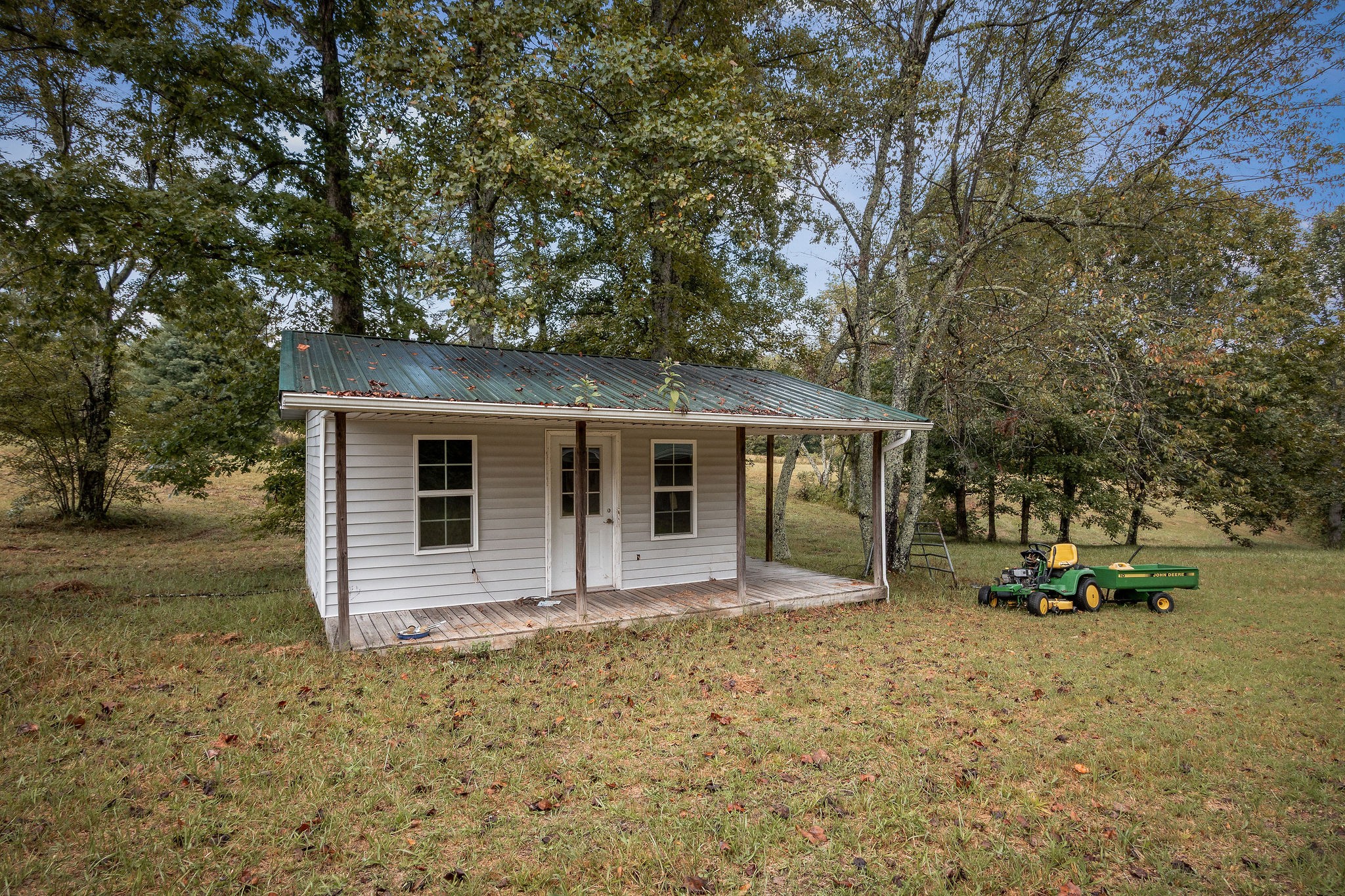 229 Craig Road Monterey, TN 38574 - Photo 11 of 18 a front view of a house with a yard