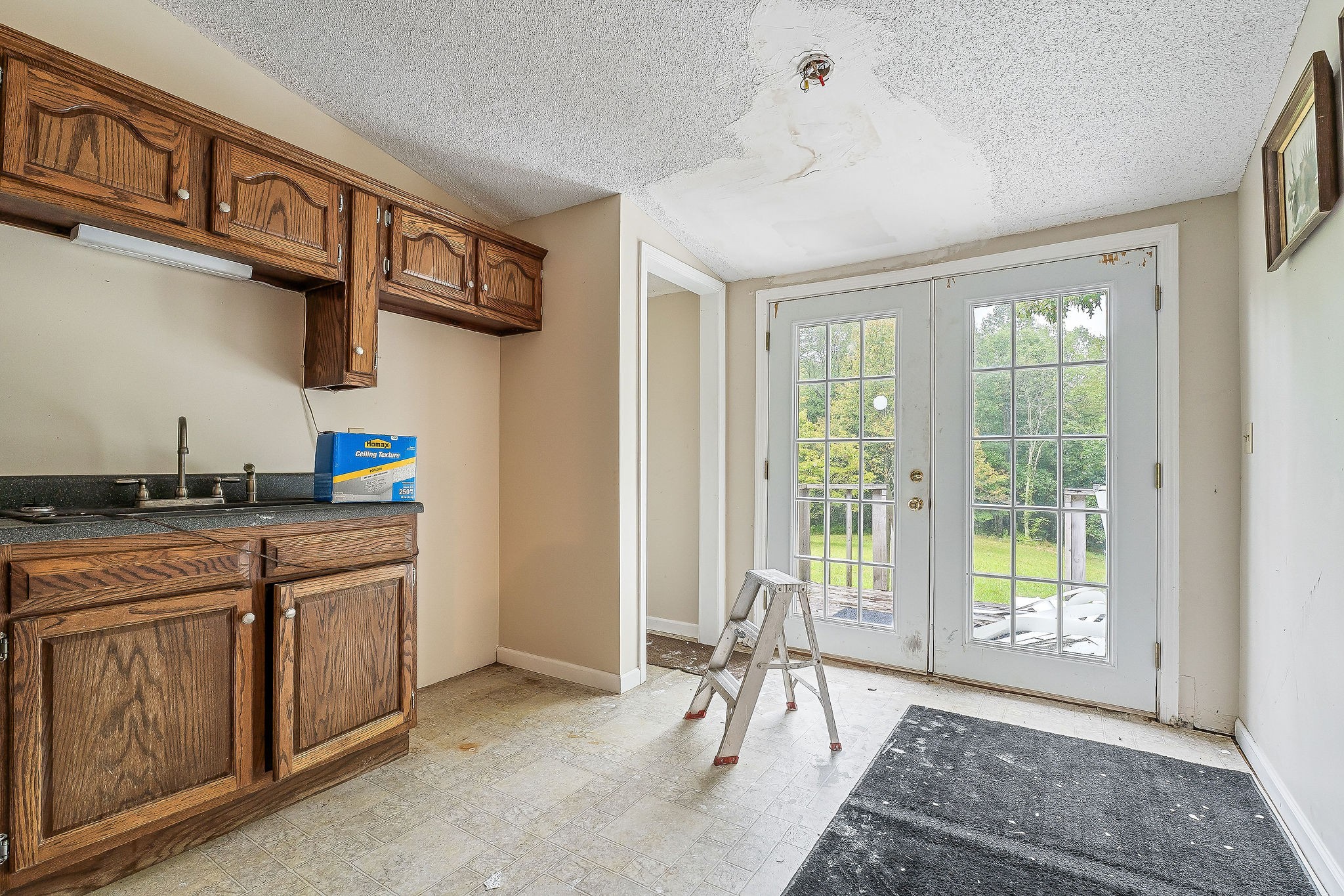 229 Craig Road Monterey, TN 38574 - Photo 2 of 18 a spacious bathroom with a granite countertop sink and a large mirror