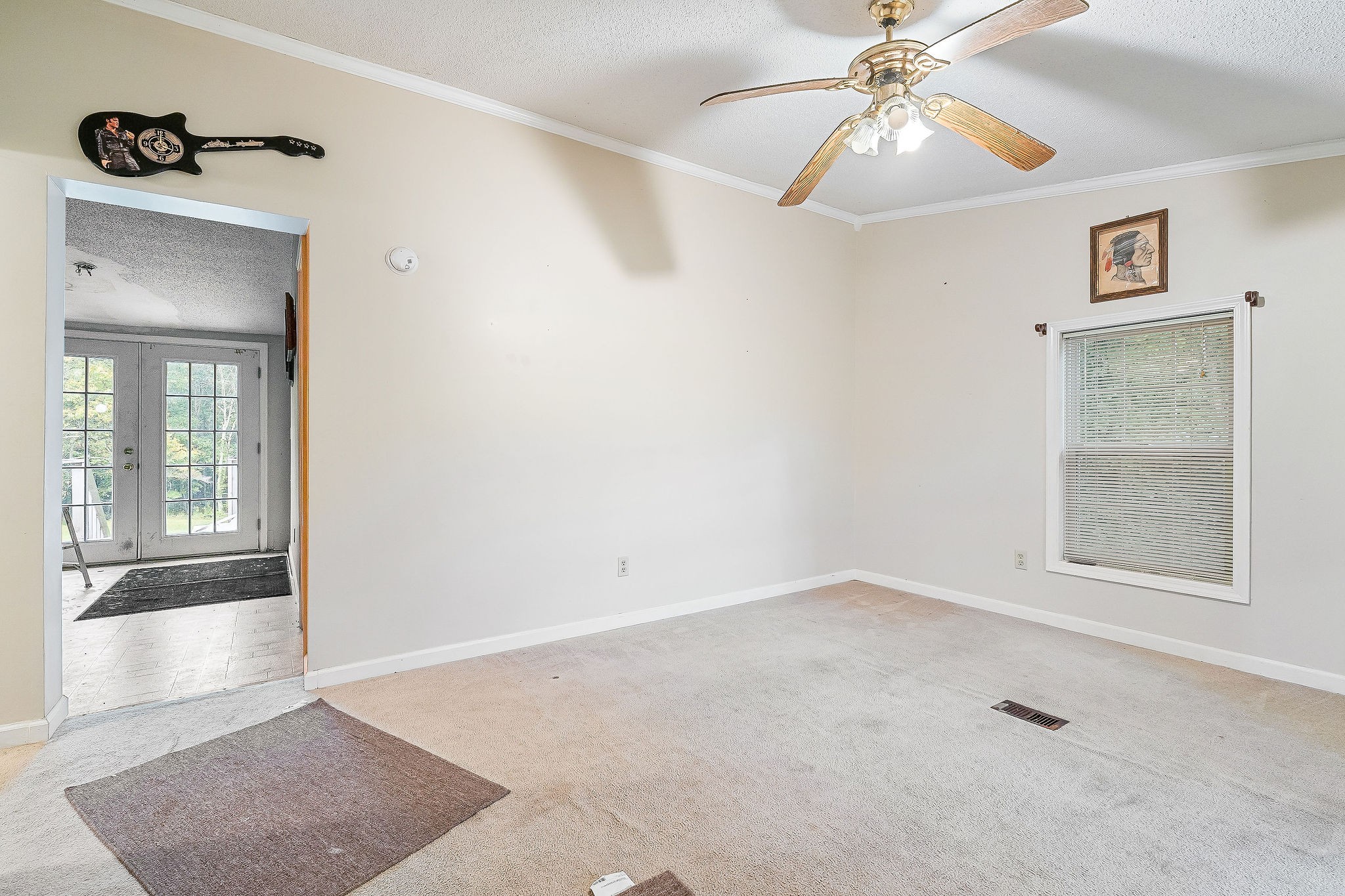 229 Craig Road Monterey, TN 38574 - Photo 5 of 18 an empty room with windows and fan