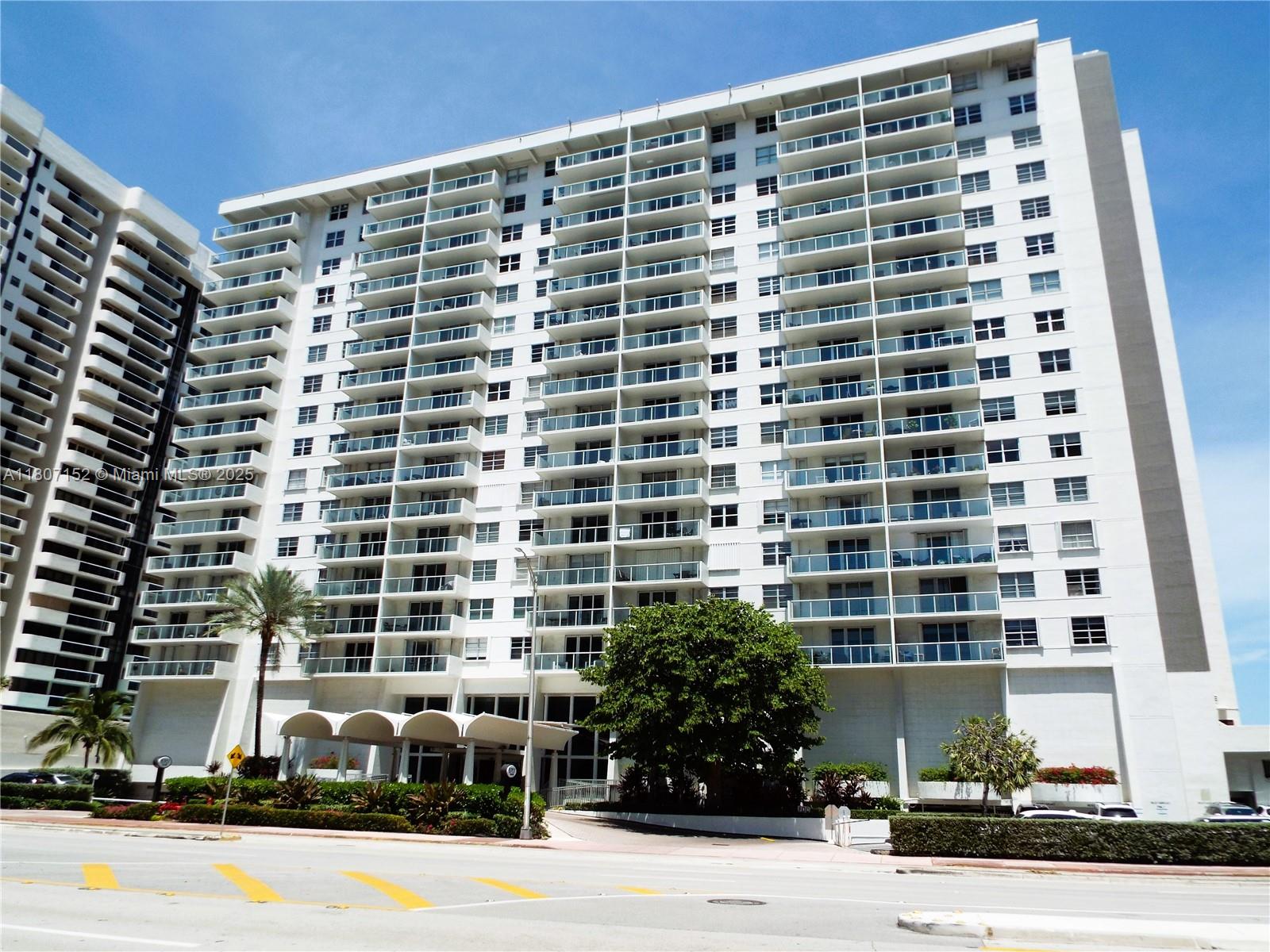 5701 Collins Avenue, Unit 1619 Miami Beach, FL 33140 - Photo 76 of 77 a front view of a building