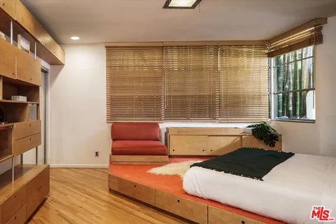 a spacious bathroom with a shower and a sink