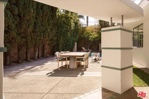 a view of hotel and seating area