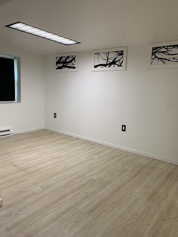 525 East County Road Rutland, MA 01543 - Photo 20 of 29 wooden floor in an empty room