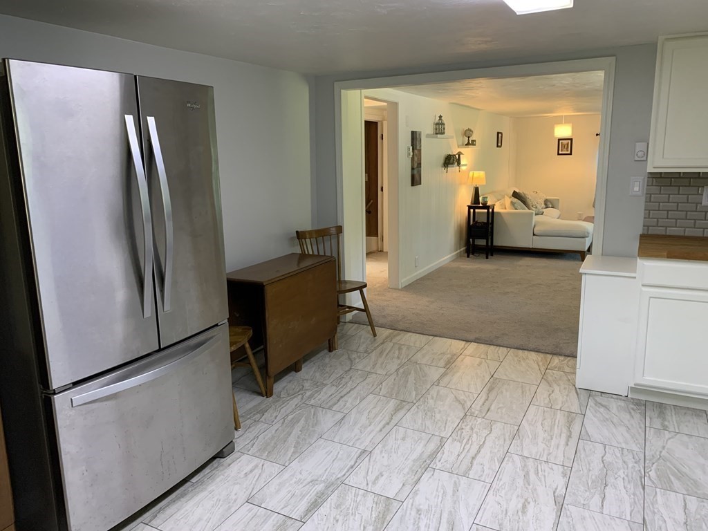 525 East County Road Rutland, MA 01543 - Photo 8 of 29 a view of kitchen with refrigerator stove and furniture