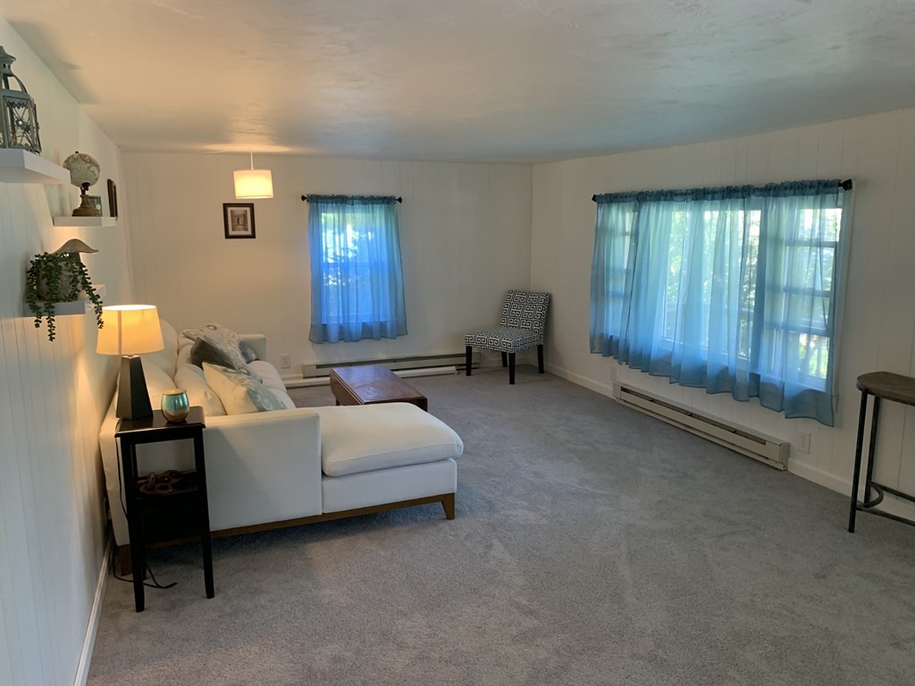 525 East County Road Rutland, MA 01543 - Photo 9 of 29 a living room with furniture and a window