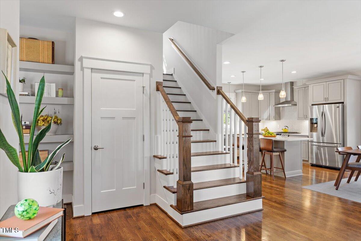 700 Coleman Street Raleigh, NC 27610 - Photo 23 of 44 a view of a hallway with wooden floor and entryway