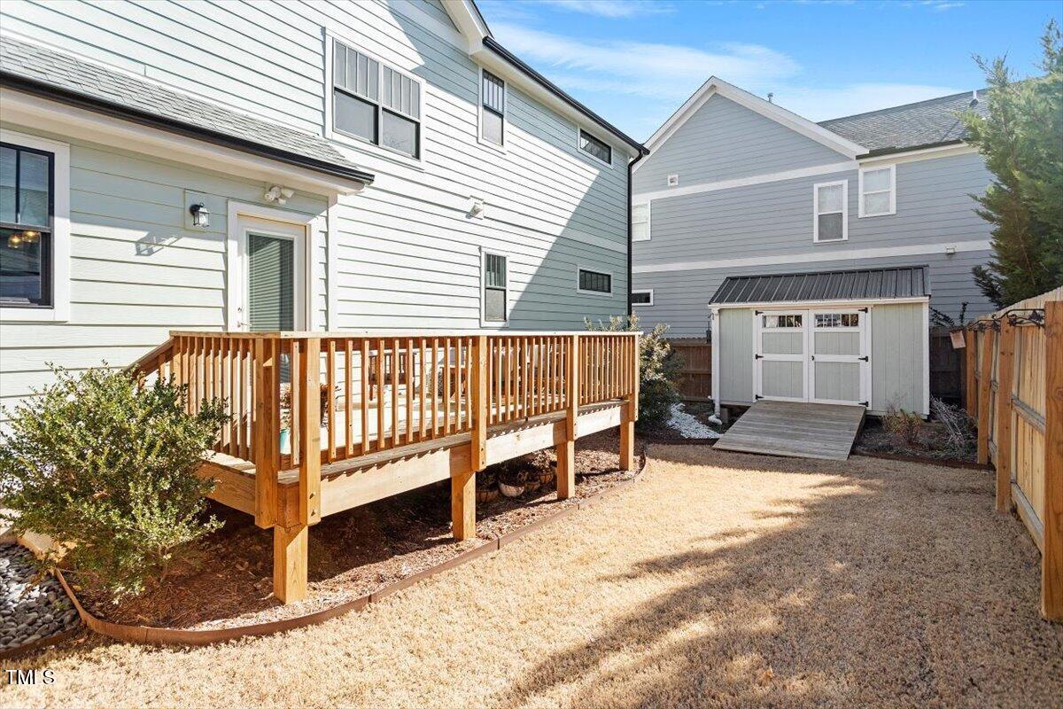 700 Coleman Street Raleigh, NC 27610 - Photo 39 of 44 a view of a house with a yard and deck
