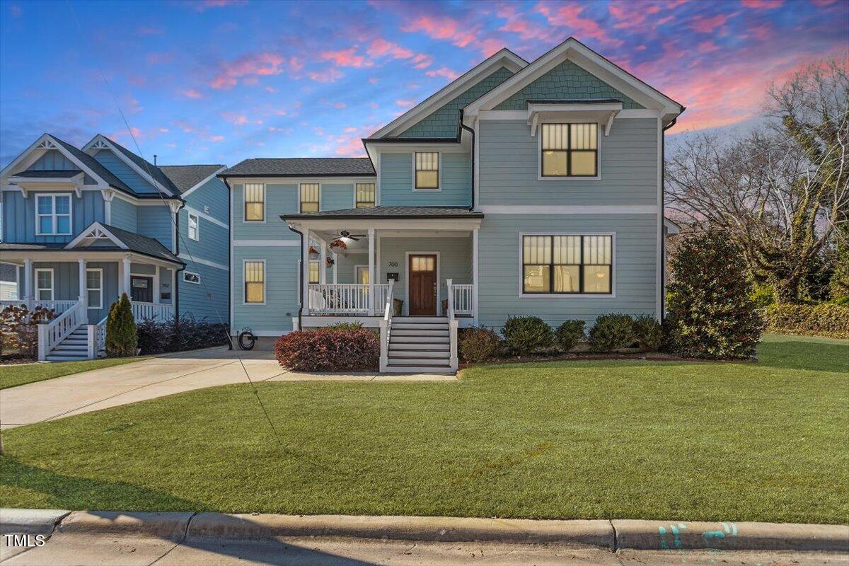 700 Coleman Street Raleigh, NC 27610 - Photo 4 of 44 a front view of a house with garden