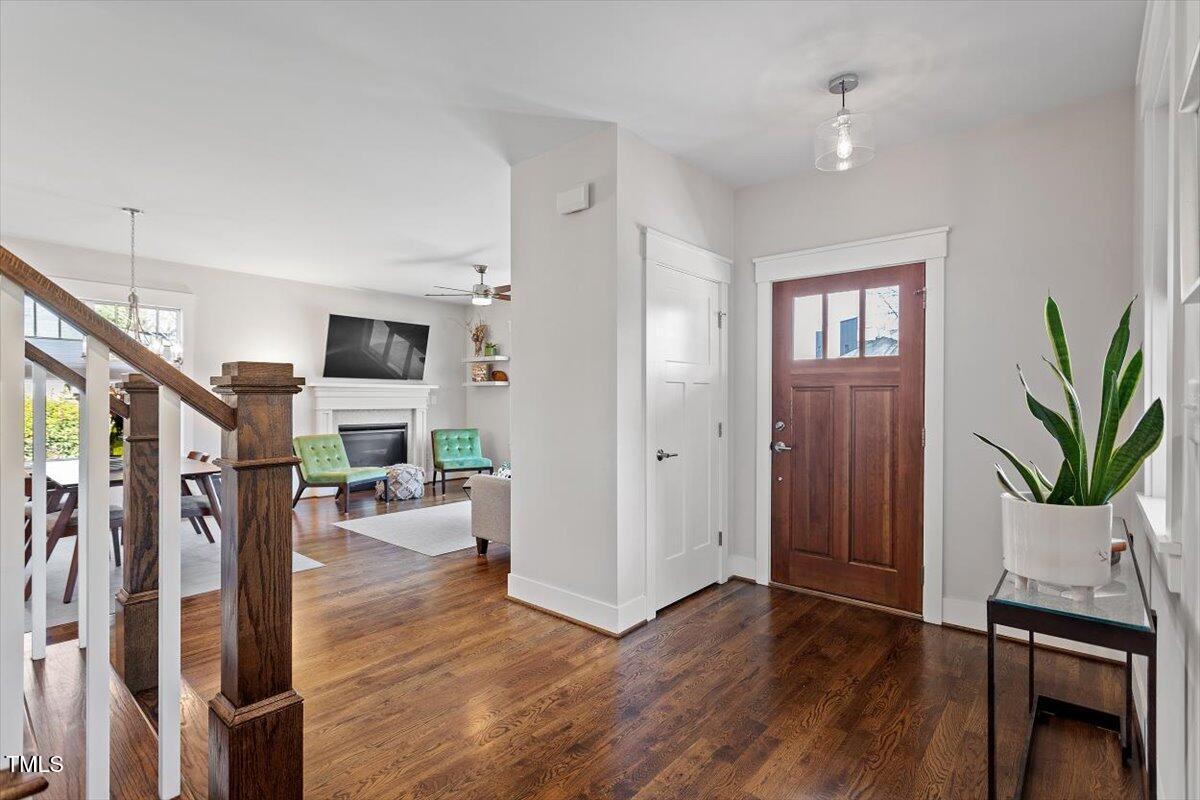 700 Coleman Street Raleigh, NC 27610 - Photo 6 of 44 a living room with furniture and a flat screen tv