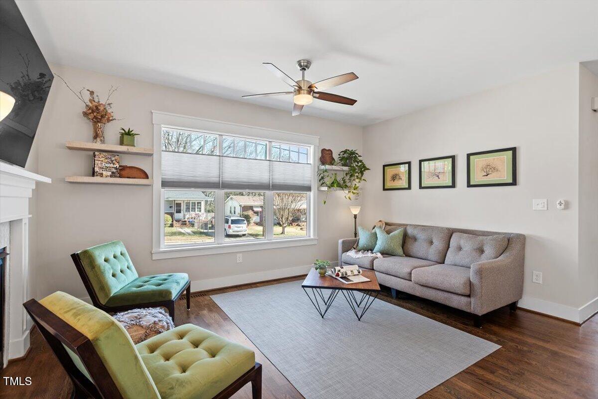 700 Coleman Street Raleigh, NC 27610 - Photo 7 of 44 a living room with furniture and a wooden floor