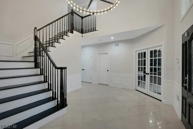 a view of entryway with stairs