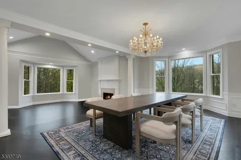 a room with furniture and a chandelier