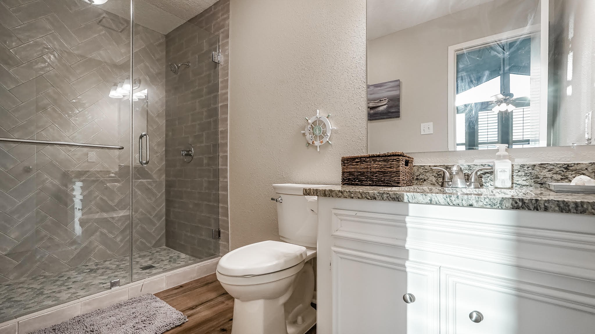 129 Capetown Conroe, TX 77356 - Photo 22 of 35 a bathroom with a sink a toilet and shower