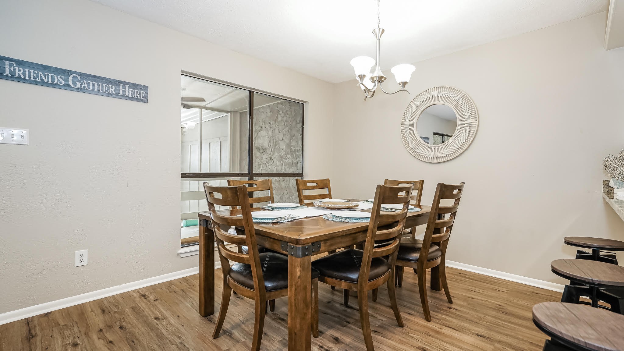 129 Capetown Conroe, TX 77356 - Photo 9 of 35 a view of a dining room with furniture and wooden floor