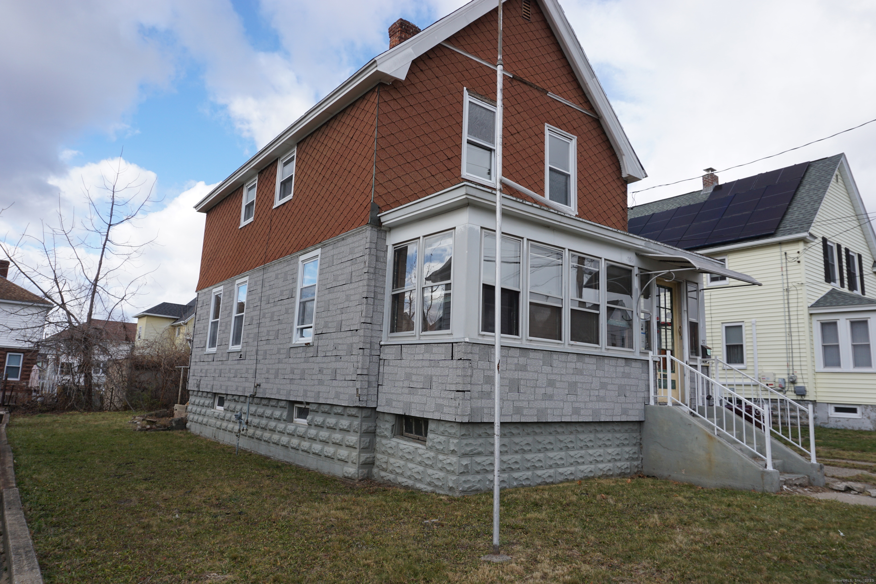 37 Franklin Street Ludlow, MA 01056 - Photo 4 of 22 a front view of a house with a garden
