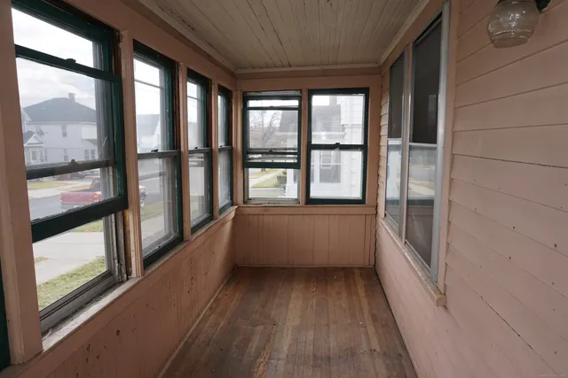 a view of a bathroom with a large window