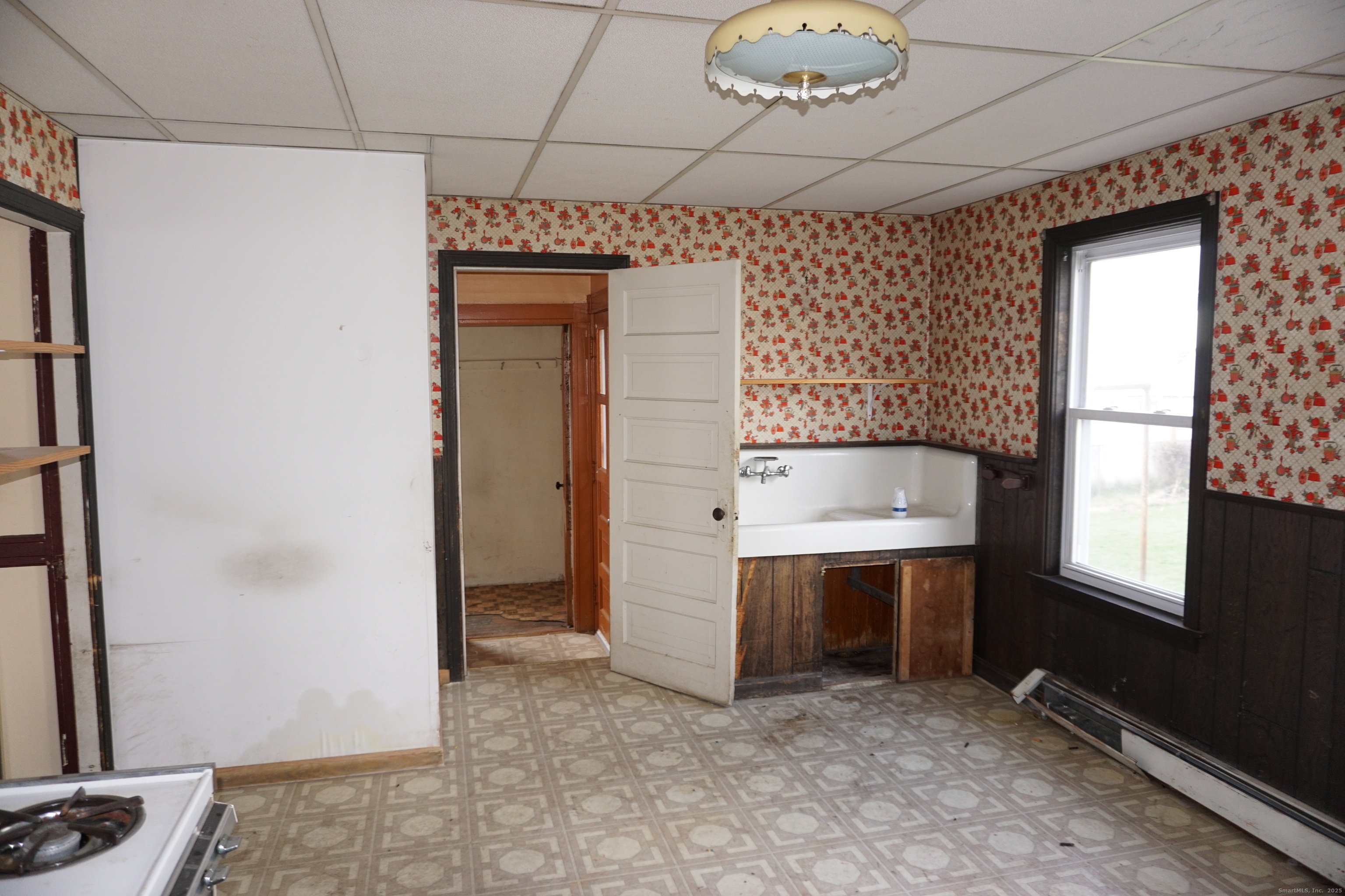 37 Franklin Street Ludlow, MA 01056 - Photo 7 of 22 a room with a bench and window