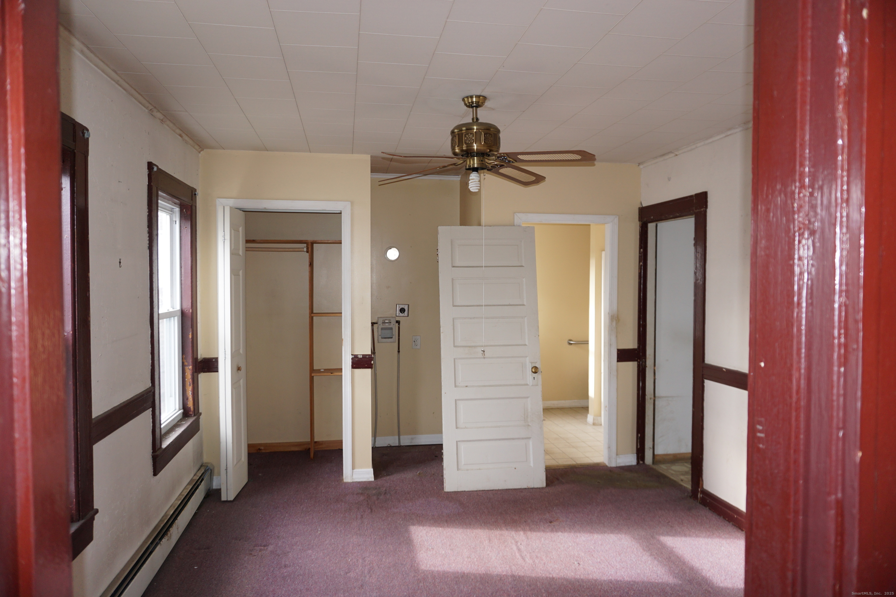 37 Franklin Street Ludlow, MA 01056 - Photo 10 of 22 wooden floor in an empty room with a bathroom
