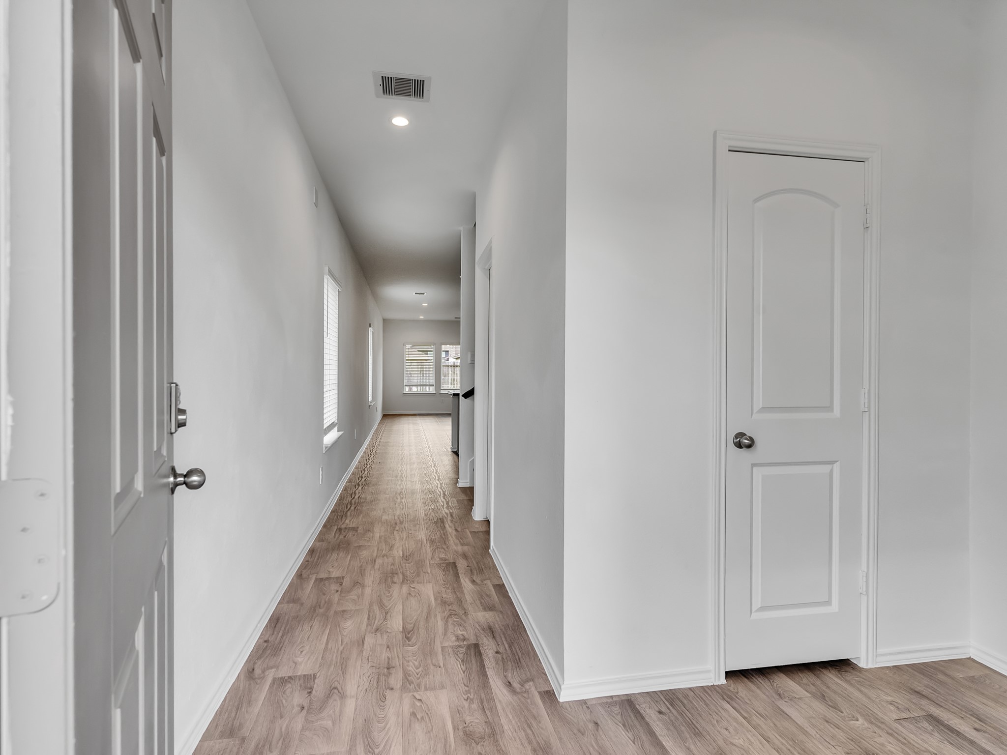 5431 Tuscany Hills Lane Spring, TX 77373 - Photo 13 of 22 a view of a hallway with wooden floor