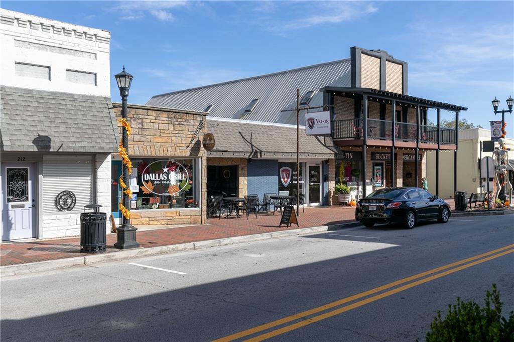 0 East Foster Avenue Dallas, GA 30132 - Photo 26 of 48 a view of a building with car parked