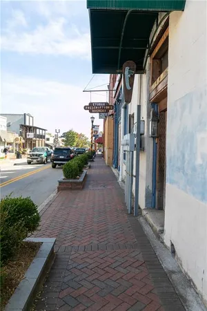 a view of a house with a street