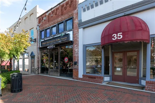 a view of a building and a street