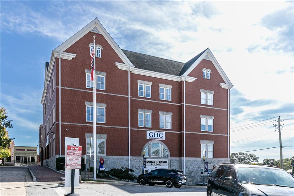 0 East Foster Avenue Dallas, GA 30132 - Photo 31 of 48 a front view of a building with street view