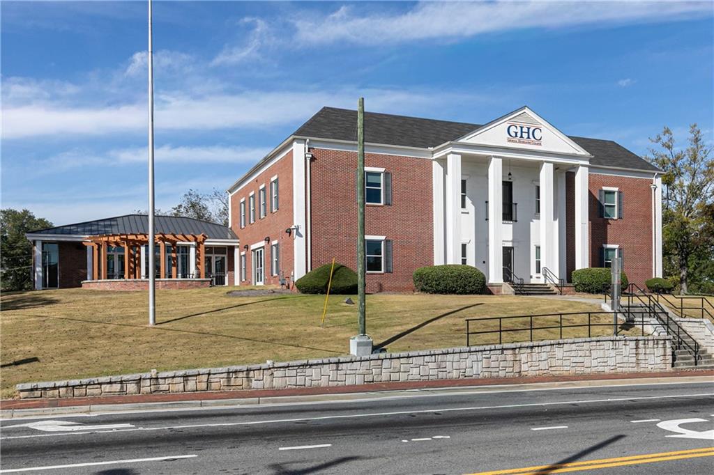 0 East Foster Avenue Dallas, GA 30132 - Photo 34 of 48 a view of a house with a yard
