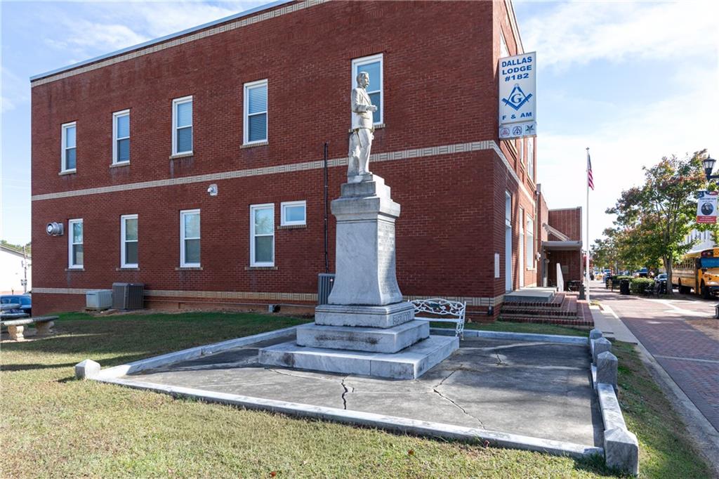 0 East Foster Avenue Dallas, GA 30132 - Photo 39 of 48 a front view of a house with garden