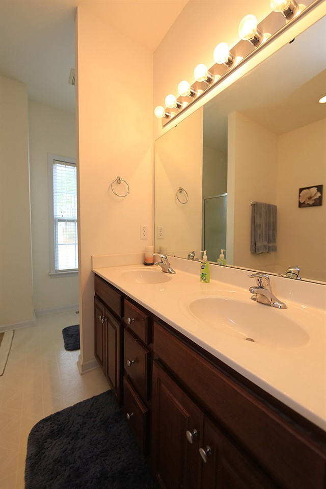 5904 Shedd Drive Raleigh, NC 27603 - Photo 14 of 25 Master bath with double vanity and garden tub. Master Bath/Spa