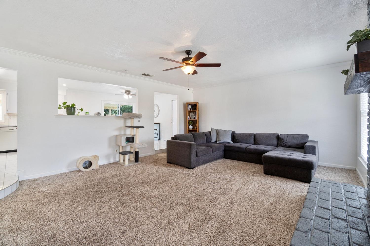 36264 Ave 12 Madera, CA 93636 - Photo 7 of 23 a living room with furniture