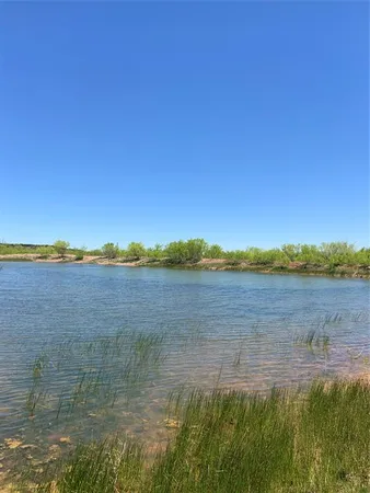 a view of lake with mountain