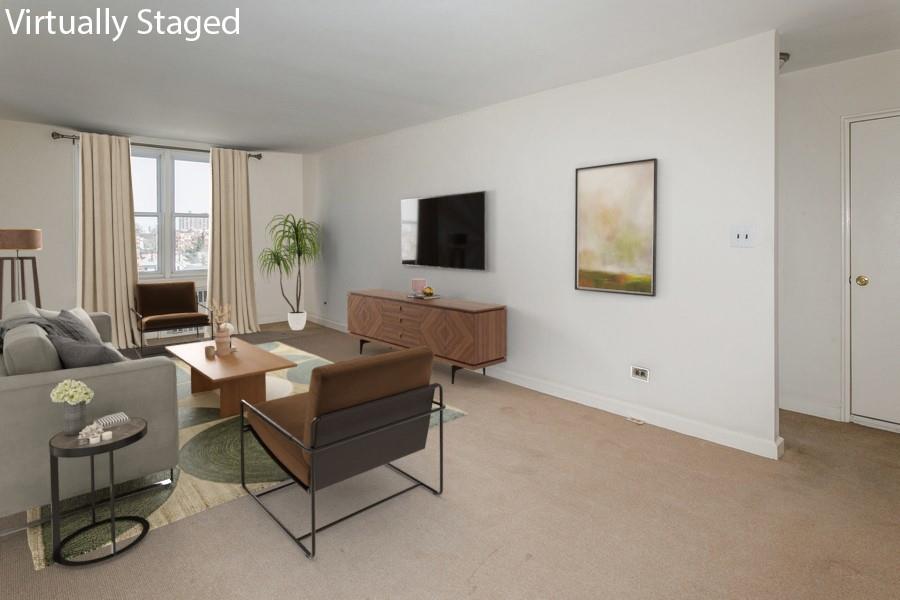 8301 Ridge Boulevard, Unit 6F Brooklyn, NY 11209 - Photo 3 of 24 a living room with furniture and a flat screen tv