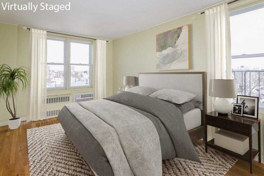 8301 Ridge Boulevard, Unit 6F Brooklyn, NY 11209 - Photo 9 of 24 a bed room with a bed and a window