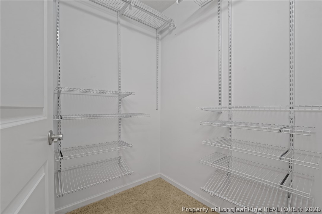 115 Shelby Street Spring Lake, NC 28390 - Photo 26 of 40 a view of a room with racks on the wall