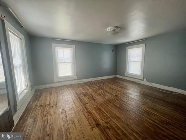 1903 Honeyville Road Stanley, VA 22851 - Photo 16 of 23 an empty room with wooden floor and windows