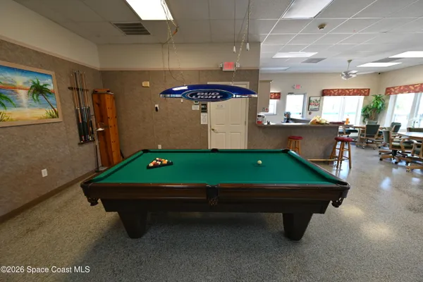a view of a chairs and table on the big yard
